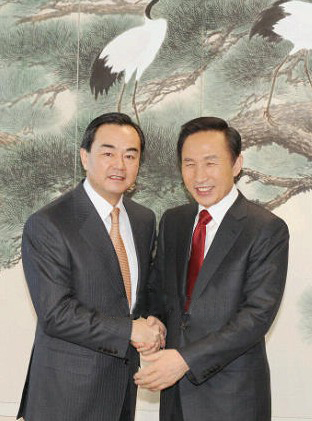 韩国当选总统李明博会见中国政府特使、外交部副部长王毅